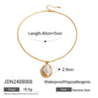 Stainless steel Baroque pearl gold necklace, earrings, and ring