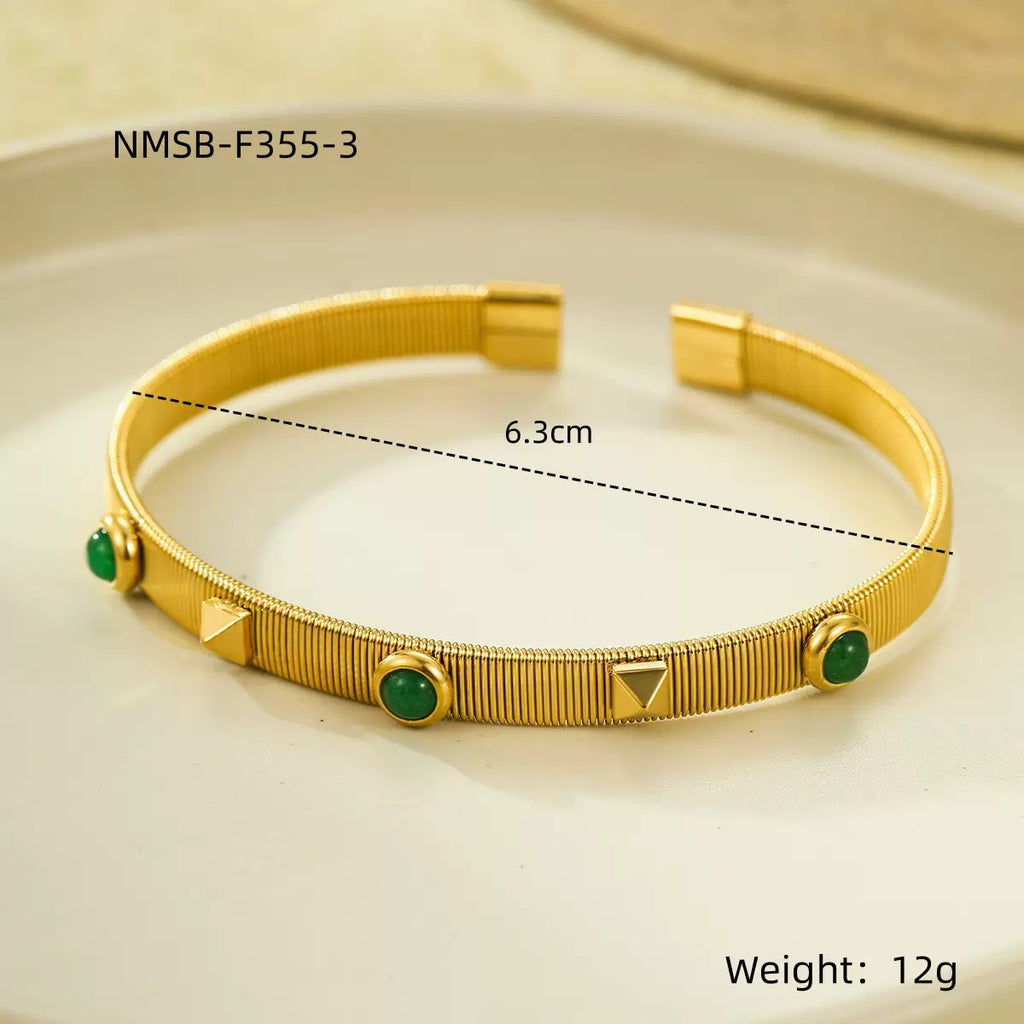 French retro court style stainless steel bracelet with zircon inlay, adjustable opening, and colorfast.