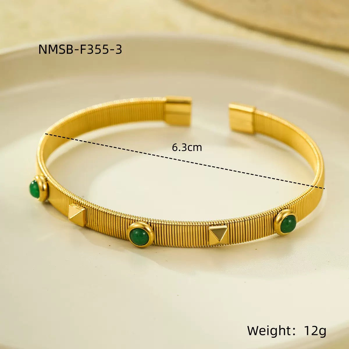 French retro court style stainless steel bracelet with zircon inlay, adjustable opening, and colorfast.
