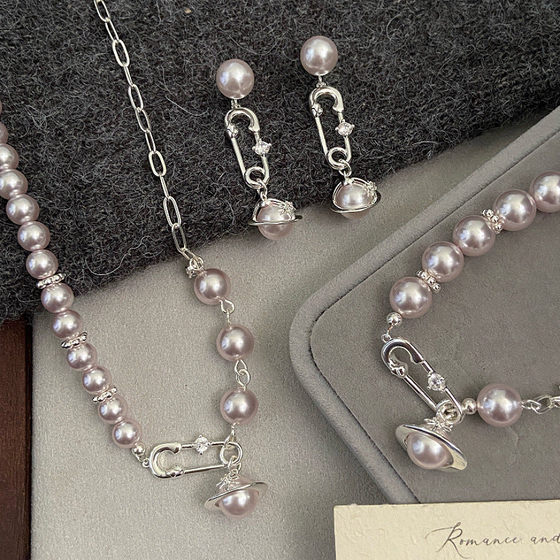 French Manta Rose Pearl Brooch Saturn Pull-Out Bracelet