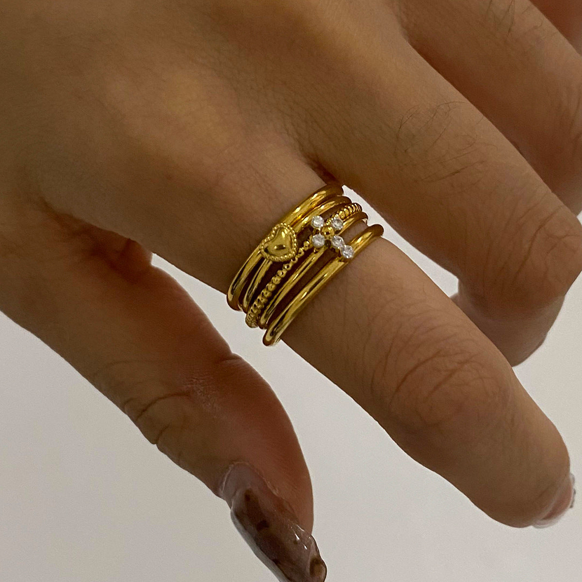 Three-piece stacked stainless steel ring set with niche design