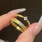 Vintage plain band brass alloy ring with single or square diamonds.