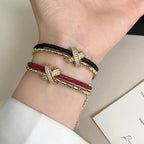 Double-layer leather cord X-letter copper alloy bracelet