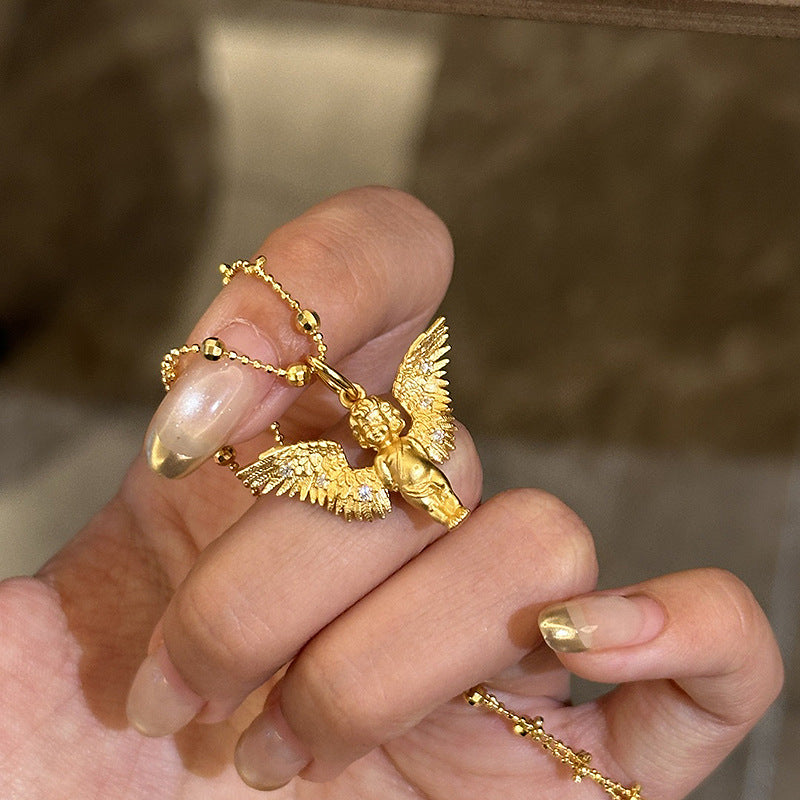 Cute little angel with golden wings copper alloy pendant