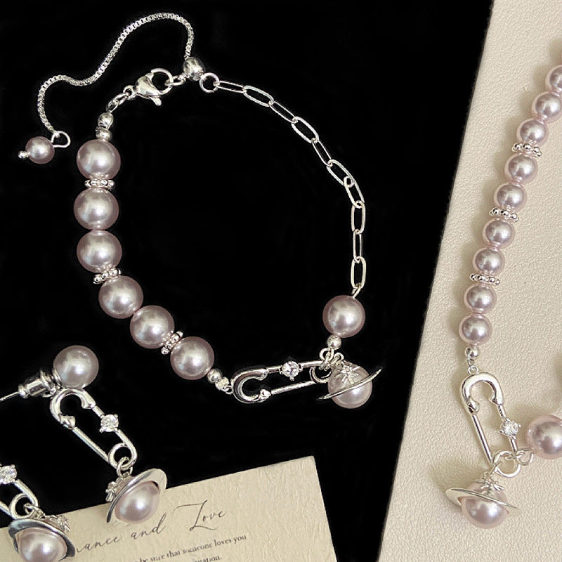 French Manta Rose Pearl Brooch Saturn Pull-Out Bracelet