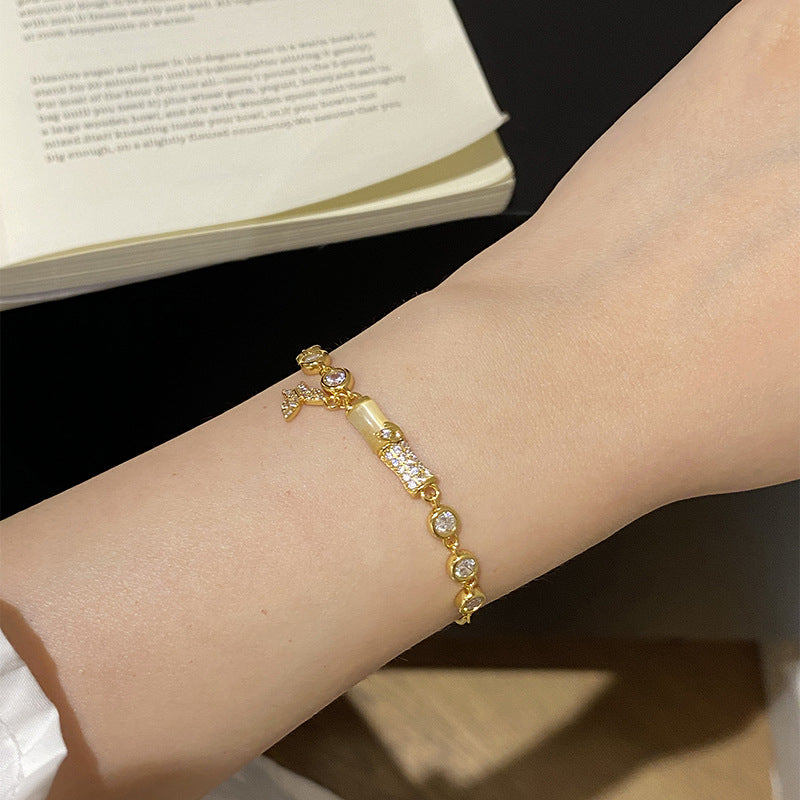 925 Sterling Silver Imitation Cat's Eye Carnation Butterfly Bracelet