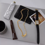 A unique and luxurious stainless steel clavicle chain with a knotted design.