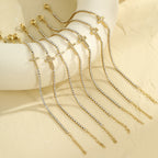 Cross-shaped diamond-encrusted stainless steel bracelet that won't fade.