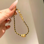 Black and gold Chanel-style chain brushed copper alloy bracelet