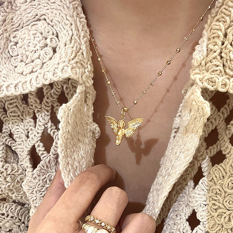 Cute little angel with golden wings copper alloy pendant