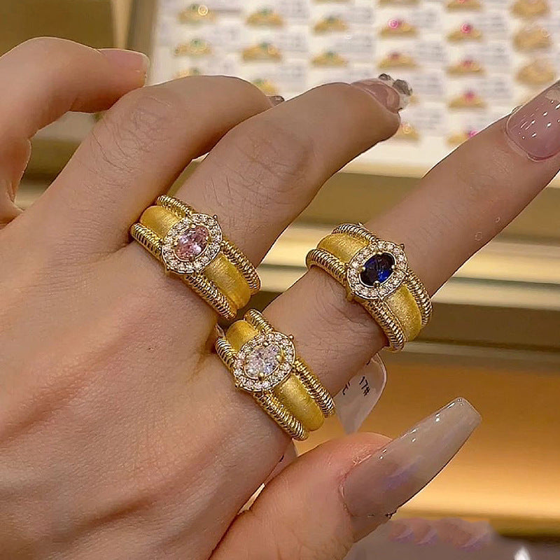 Sparkling diamond wide beaded brushed pigeon egg copper alloy ring