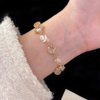 Natural freshwater pearl, amethyst, rose quartz, citrine, colored zircon, four-leaf clover, stacked copper alloy bracelet