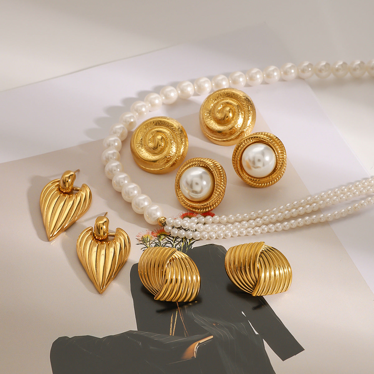 High-end floral pearl stainless steel stud earrings