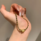 Black and gold Chanel-style chain brushed copper alloy bracelet