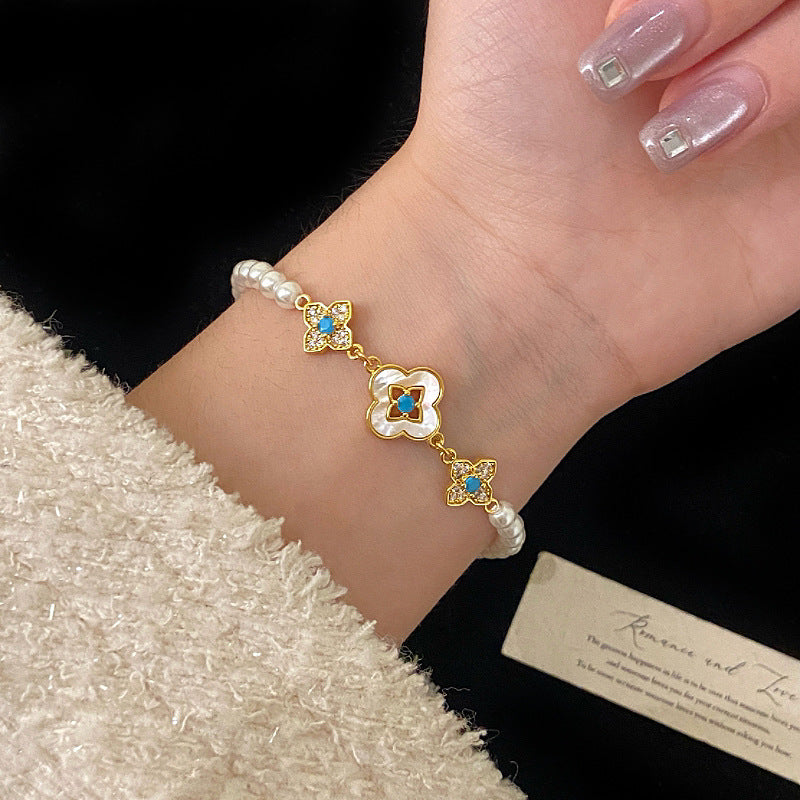 Natural mother-of-pearl four-leaf clover full diamond bead copper alloy bracelet