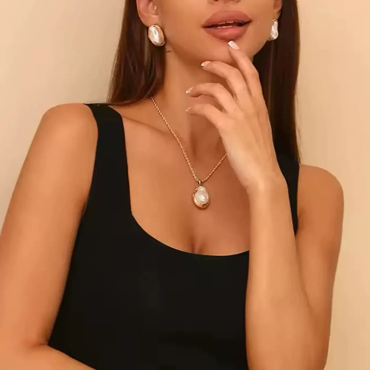 Stainless steel Baroque pearl gold necklace, earrings, and ring