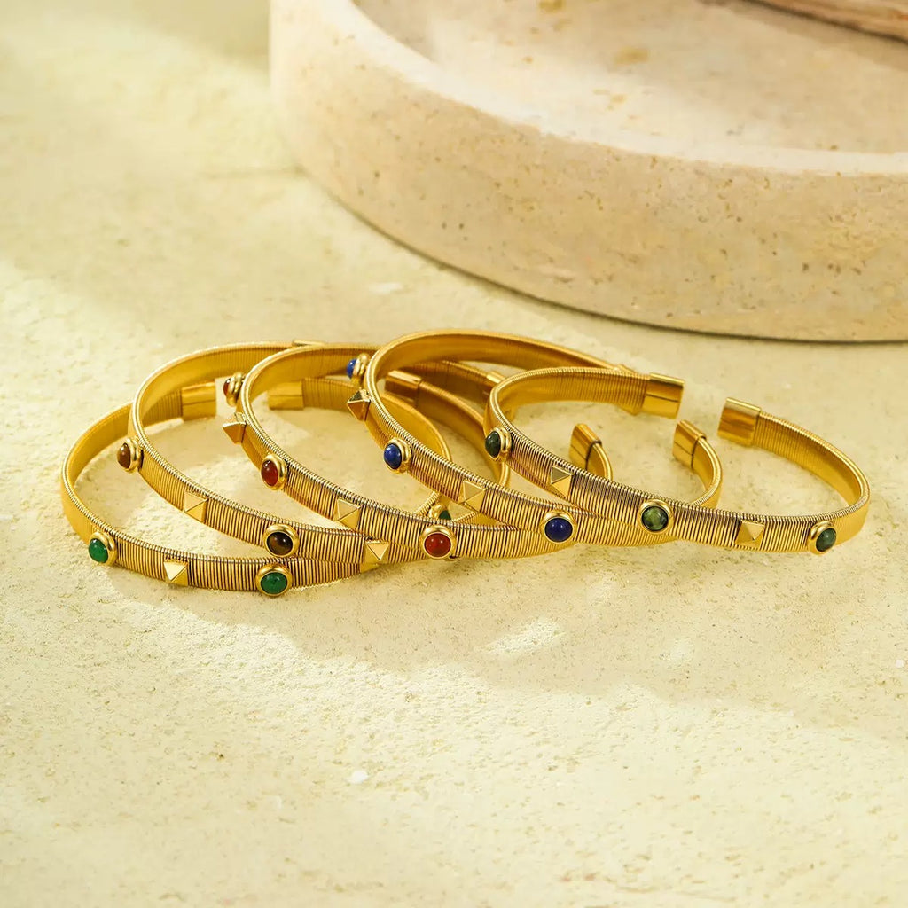 French retro court style stainless steel bracelet with zircon inlay, adjustable opening, and colorfast.