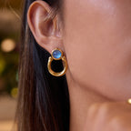 Blue resin stainless steel earrings with a touch of understated luxury.