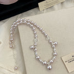 Manta Rose Pearl Necklace and Copper Alloy Bracelet