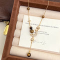 Mélard Vintage Tiger Eye Stone Star Moon Bead Tassel Copper Alloy Necklace