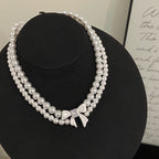 Double-layer pearl bow zircon copper alloy set