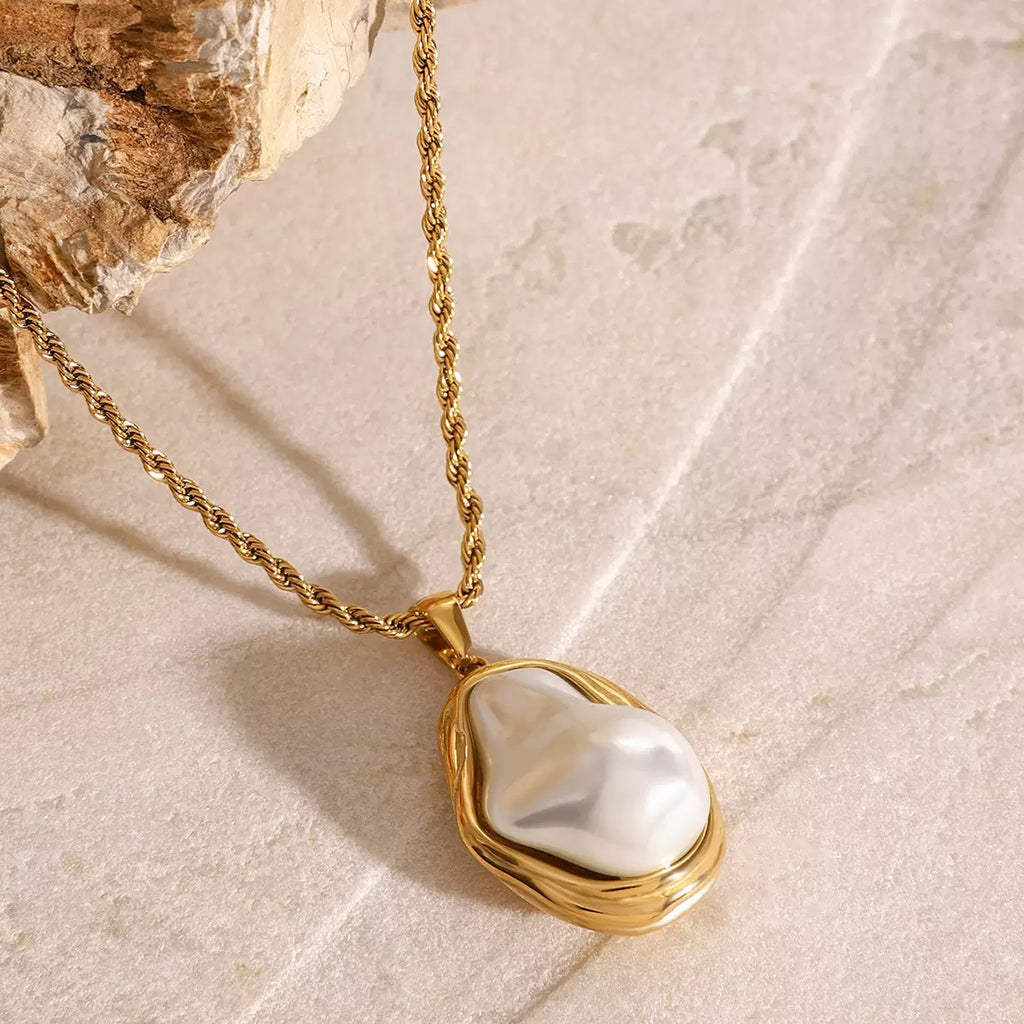 Stainless steel Baroque pearl gold necklace, earrings, and ring