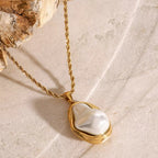 Stainless steel Baroque pearl gold necklace, earrings, and ring