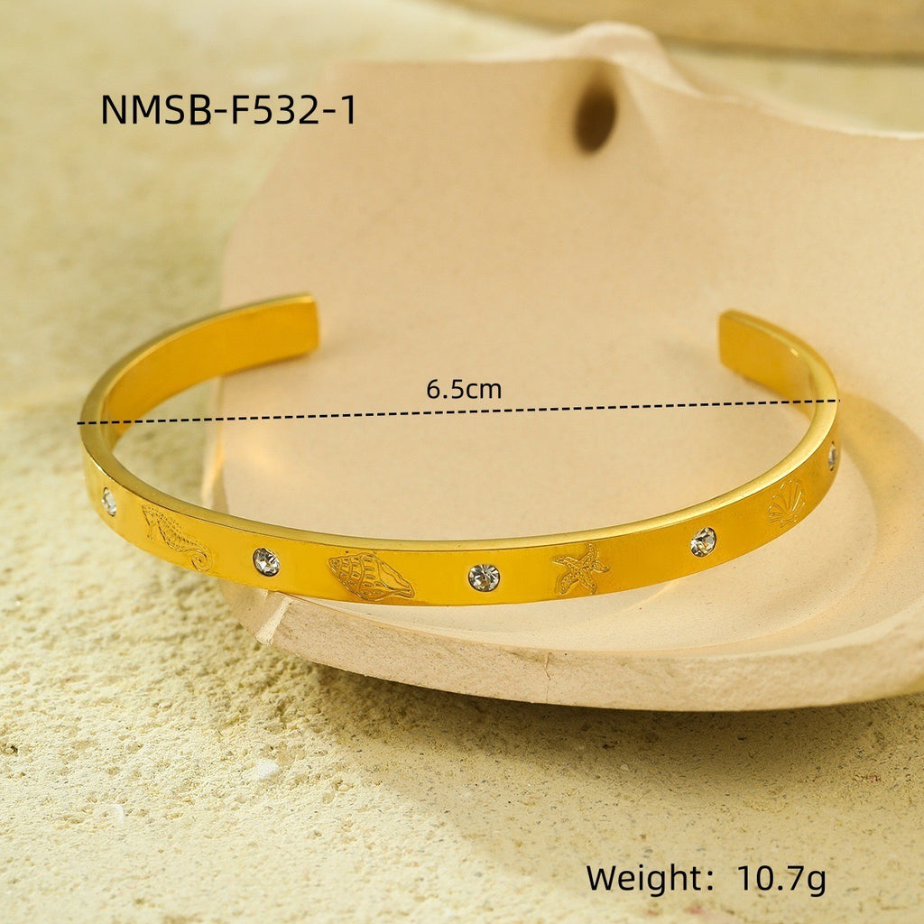 Unique and versatile open stainless steel bracelet with round zircon setting, part of the Ocean Series.