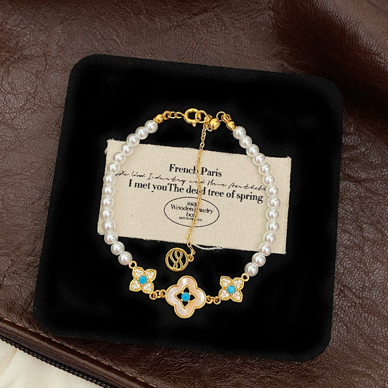 Natural mother-of-pearl four-leaf clover full diamond bead copper alloy bracelet