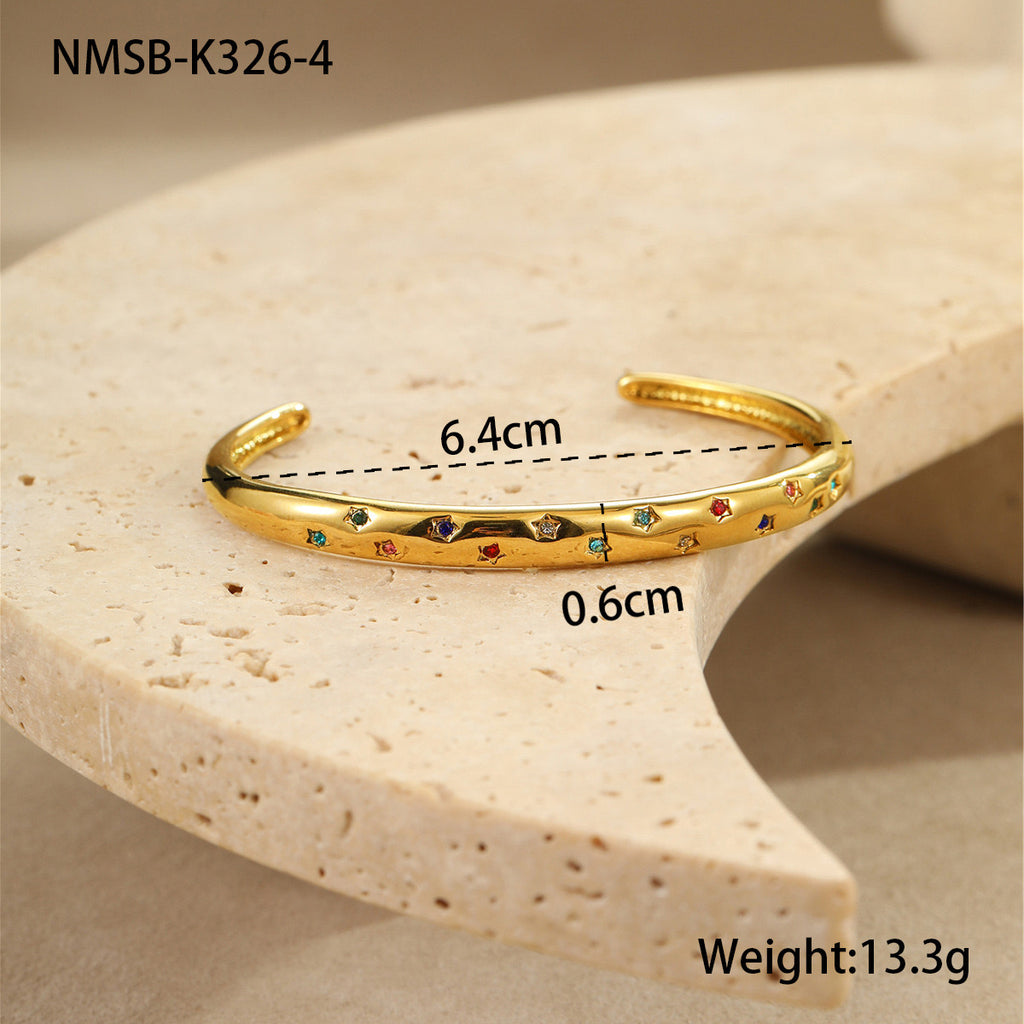 Stylish stainless steel bracelet with a striking five-pointed star design and diamond embellishments.