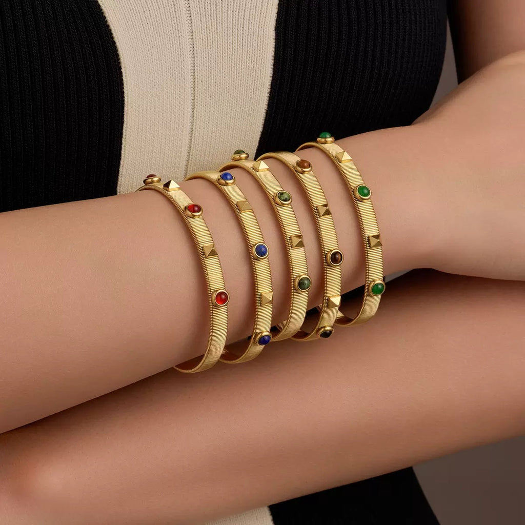 French retro court style stainless steel bracelet with zircon inlay, adjustable opening, and colorfast.