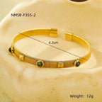 French retro court style stainless steel bracelet with zircon inlay, adjustable opening, and colorfast.