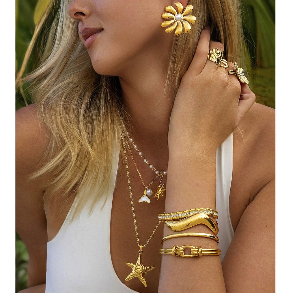 Stainless steel pearl layered floral set