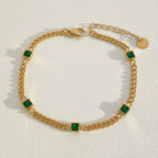 Stainless steel stacked bracelet with PVD-plated small gold beads and gold chain