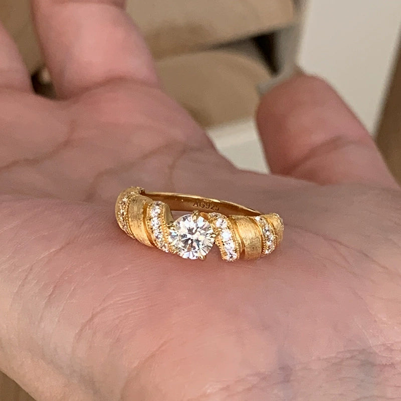 Five-flower rotating copper alloy diamond ring