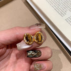 Radl oval tiger's eye gold-plated copper alloy earrings