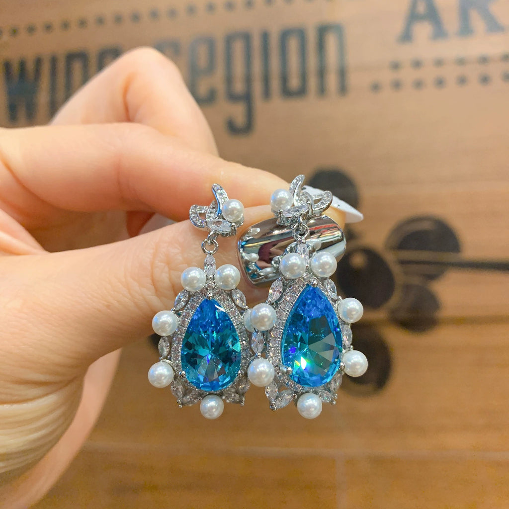 Zircon, Pearl, Micro-painted Pearl, Aquamarine, Diamond, and Gemstone Set