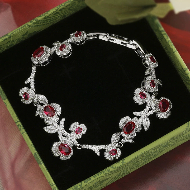 Red sapphire zircon inlaid with rose and camellia bracelet