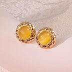 Cat-eye small round diamond pattern colorful gold-edged button style stainless steel stud earrings