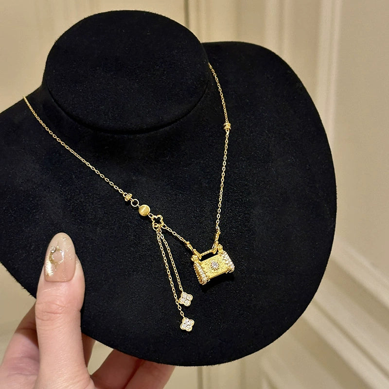 Fully rhinestone tassel brushed four-leaf clover lock case copper alloy necklace