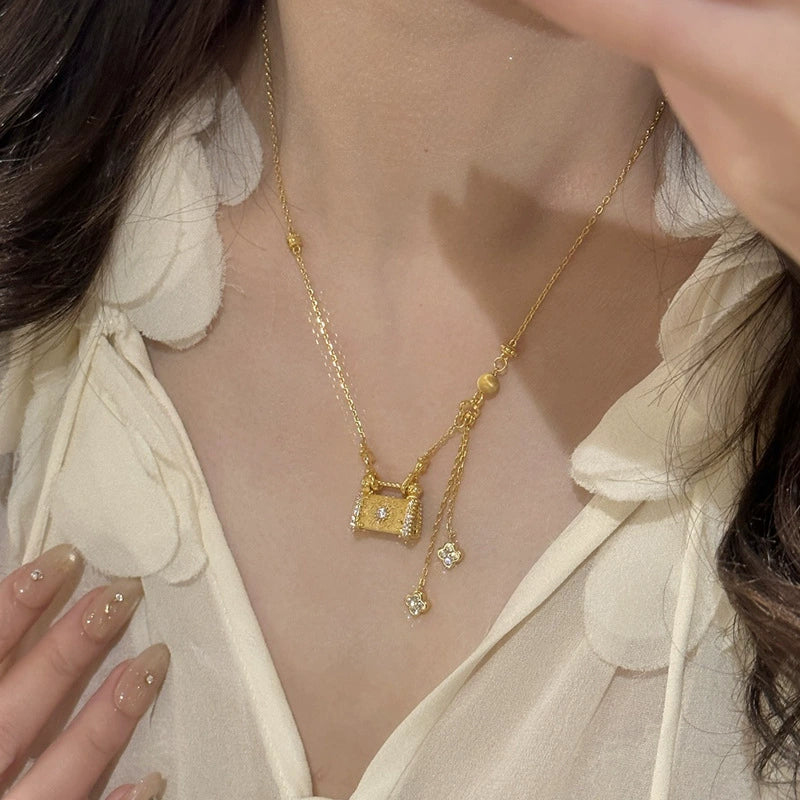 Fully rhinestone tassel brushed four-leaf clover lock case copper alloy necklace