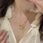 Fully rhinestone tassel brushed four-leaf clover lock case copper alloy necklace