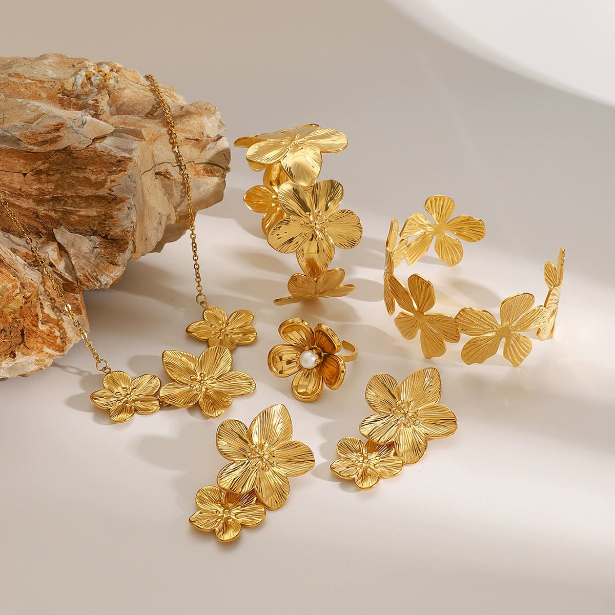 Stainless steel flower necklace, zircon earrings, pearl ring