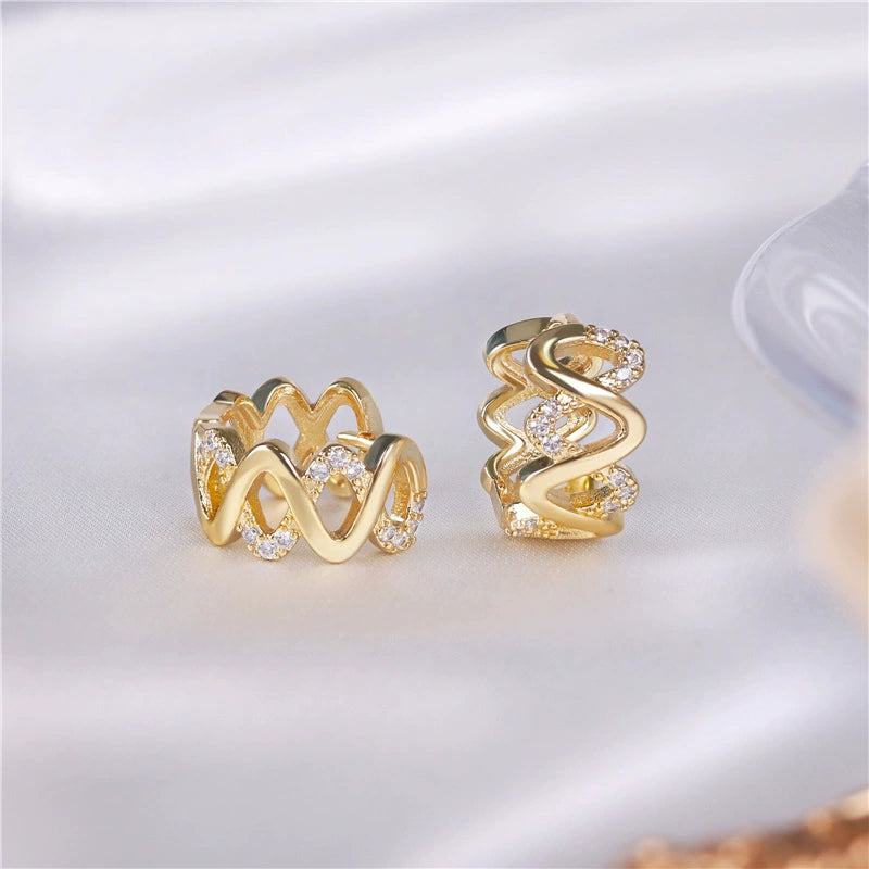 Zirconia-set French brass earrings
