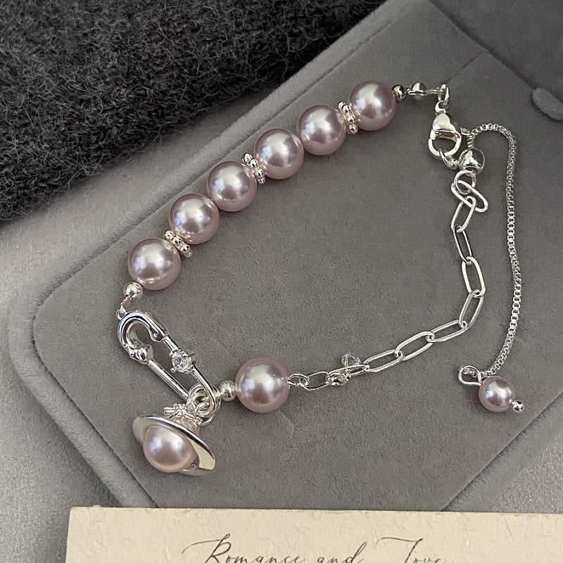 French Manta Rose Pearl Brooch Saturn Pull-Out Bracelet