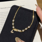 925 Sterling Silver Imitation Cat's Eye Carnation Butterfly Bracelet